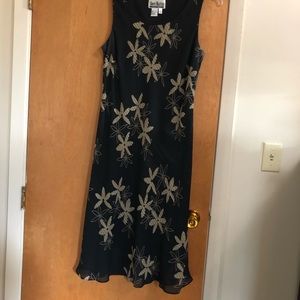 Adorable sleeveless black dress w/ matching wrap